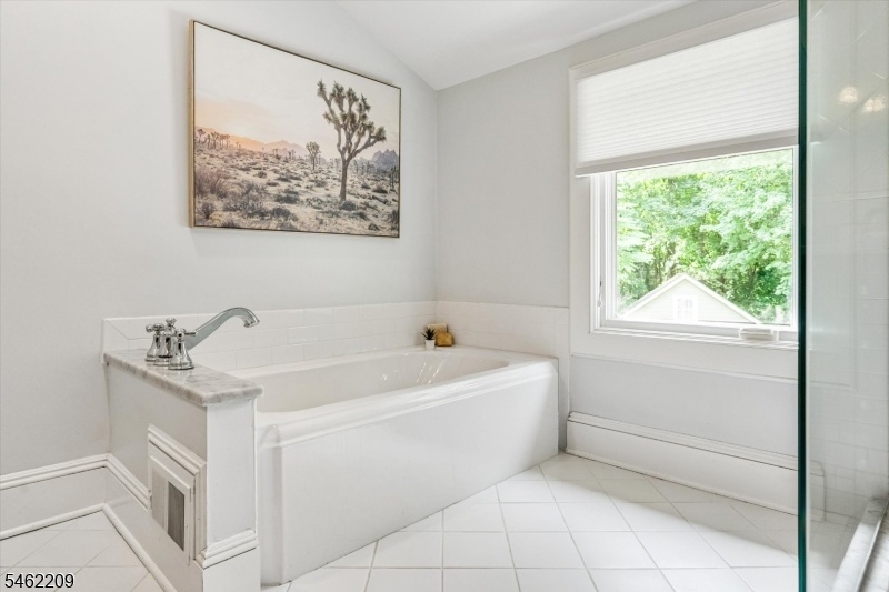 Separate soaking tub
