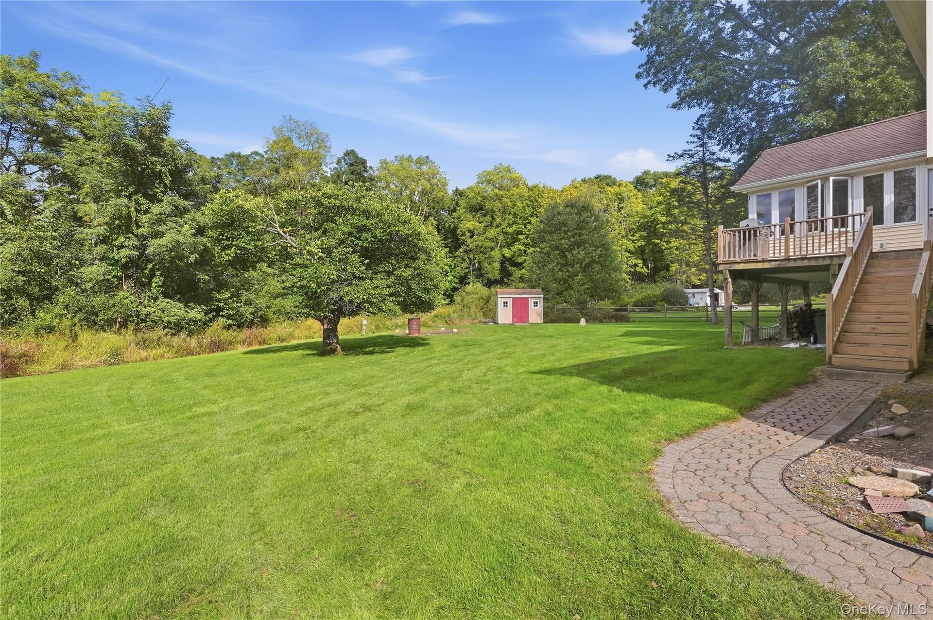 Beautiful level yard ready for its next owner!
