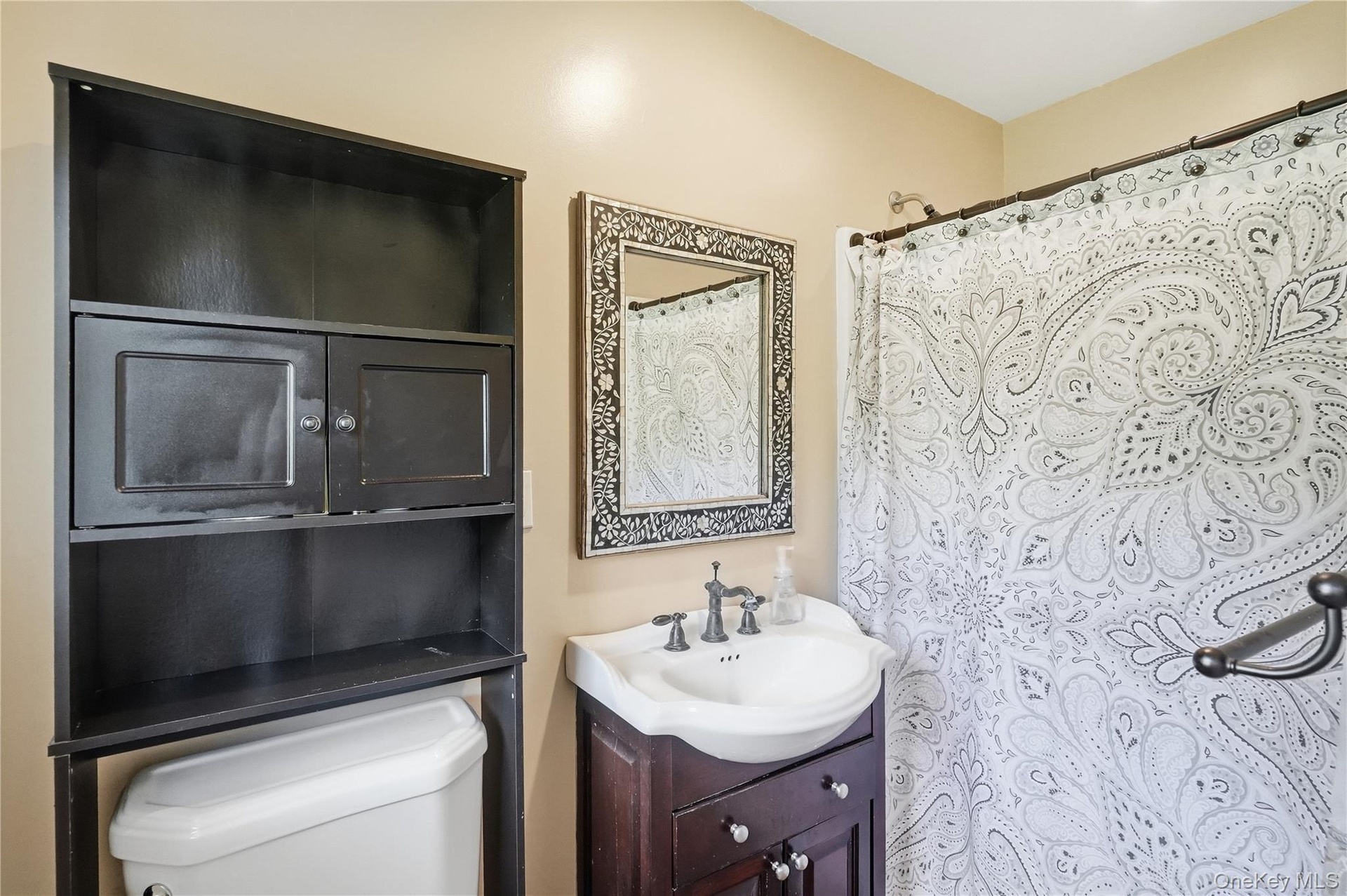 Primary bath featuring stand in shower