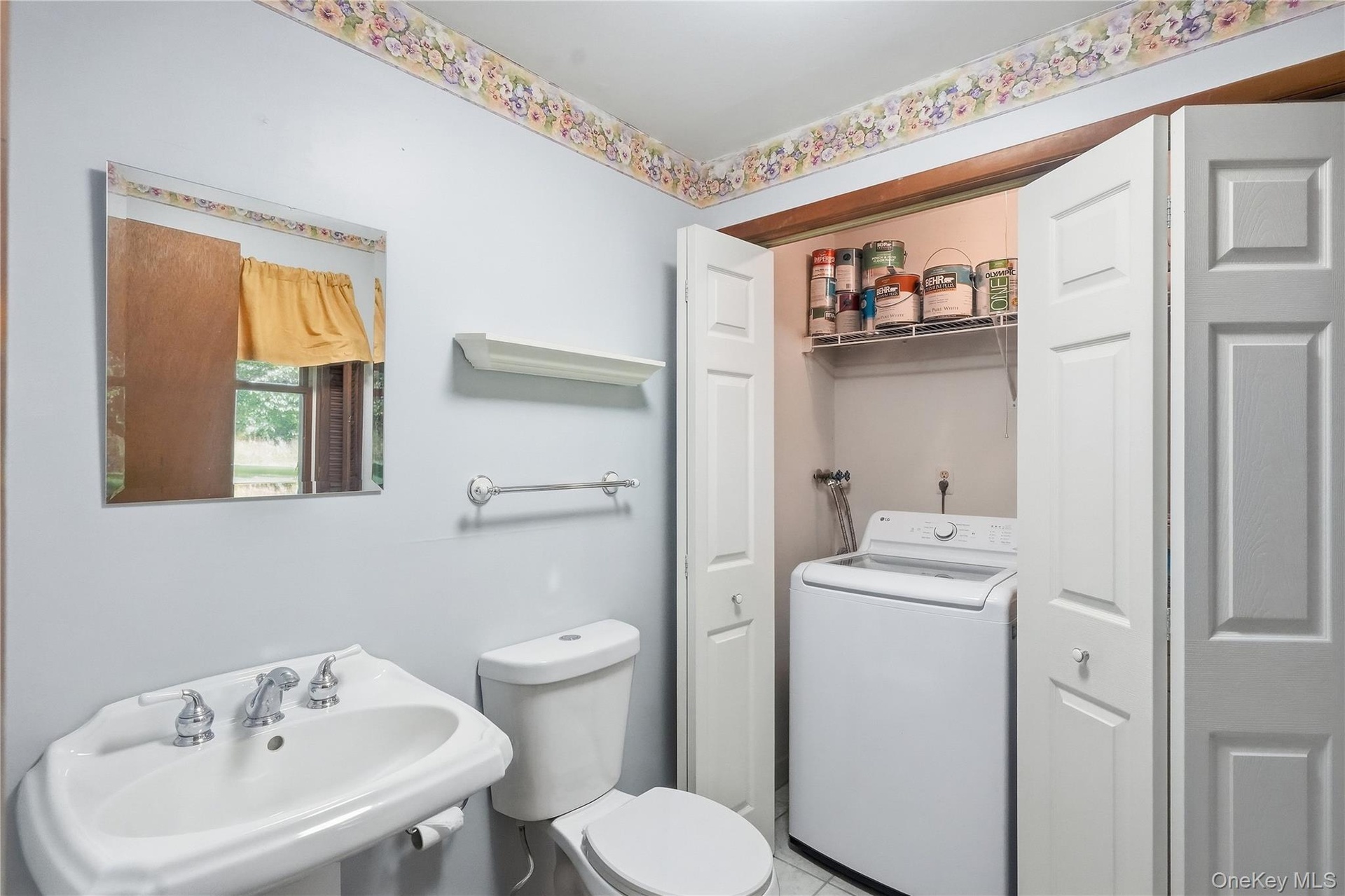 Half bath and laundry room in lower level