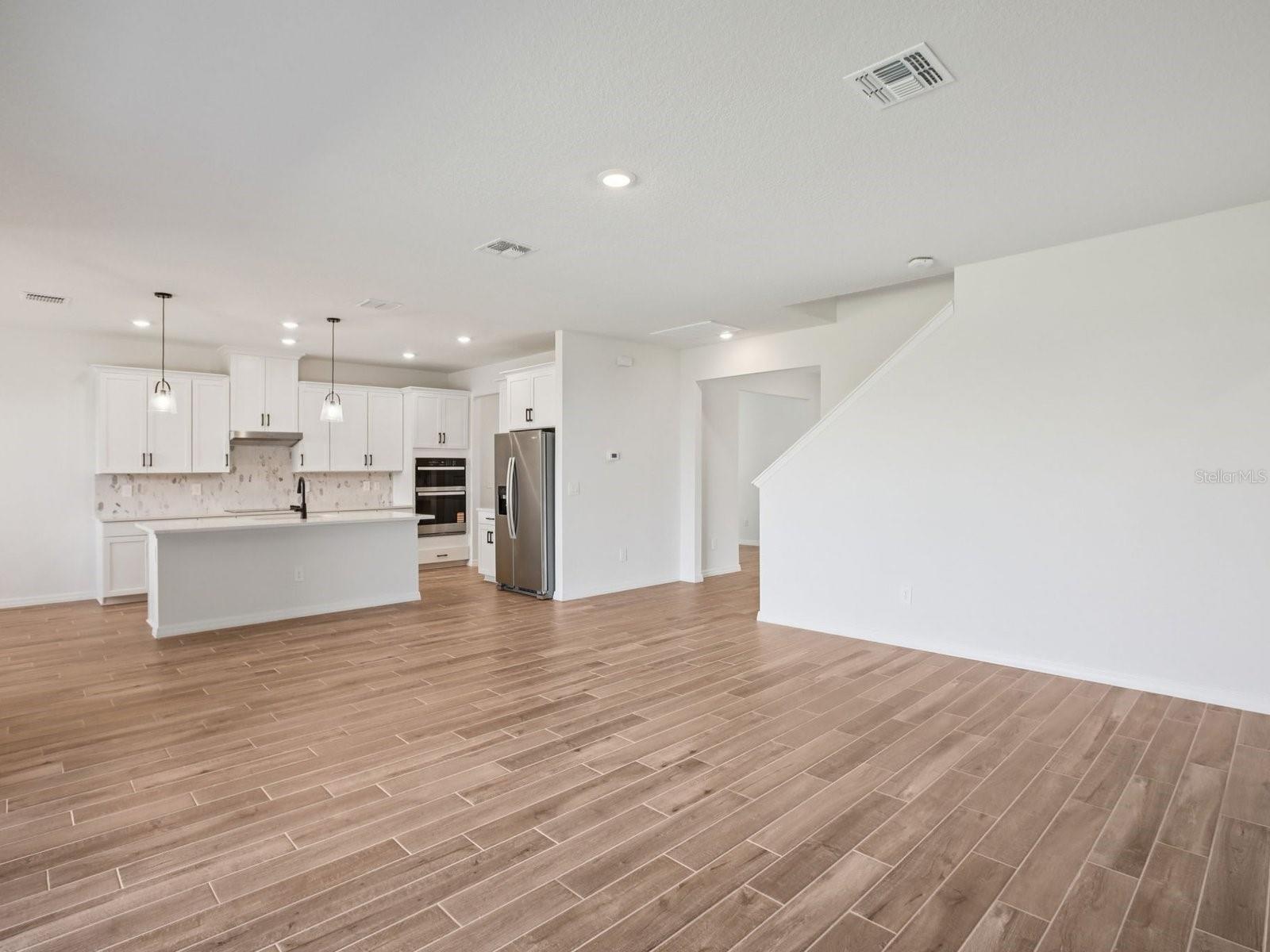 Photo is not of the actual home, but is an inspirational photo of builder’s model home and may depict options, furnishings, and/or decorator features 
