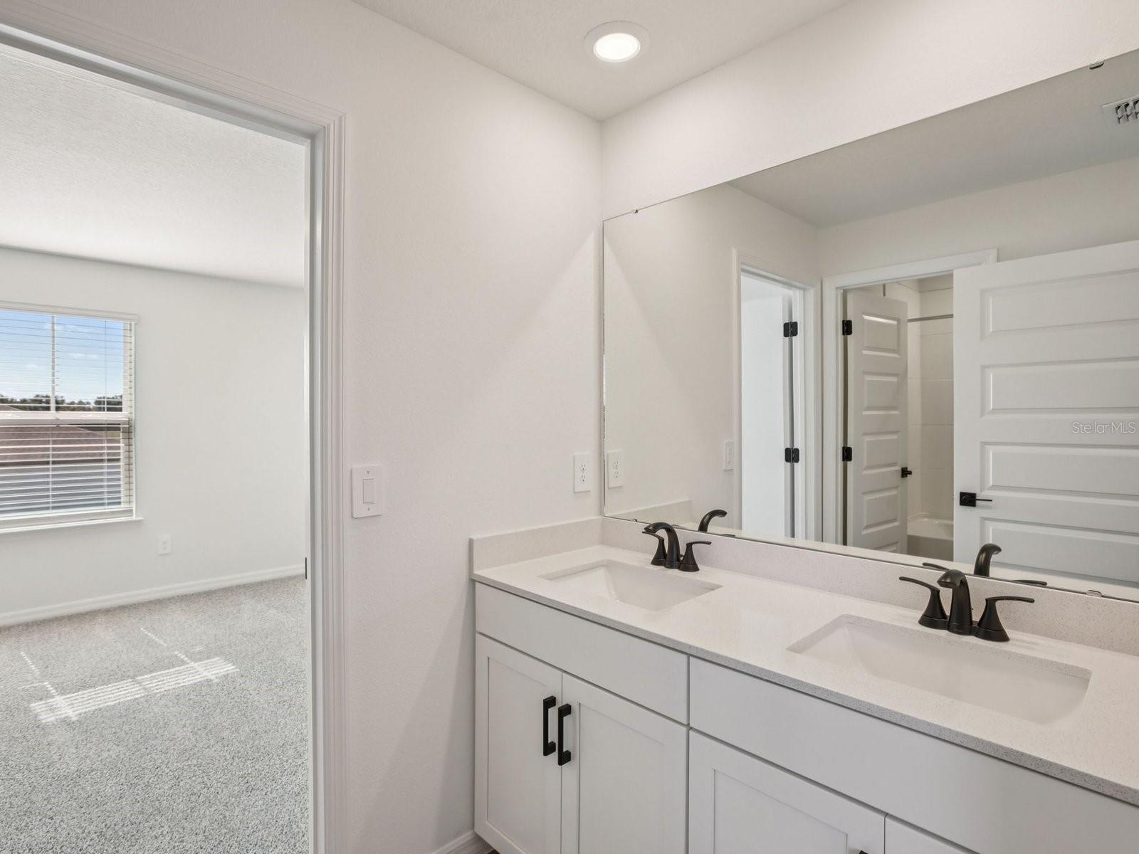 Photo is not of the actual home, but is an inspirational photo of builder’s model home and may depict options, furnishings, and/or decorator features 