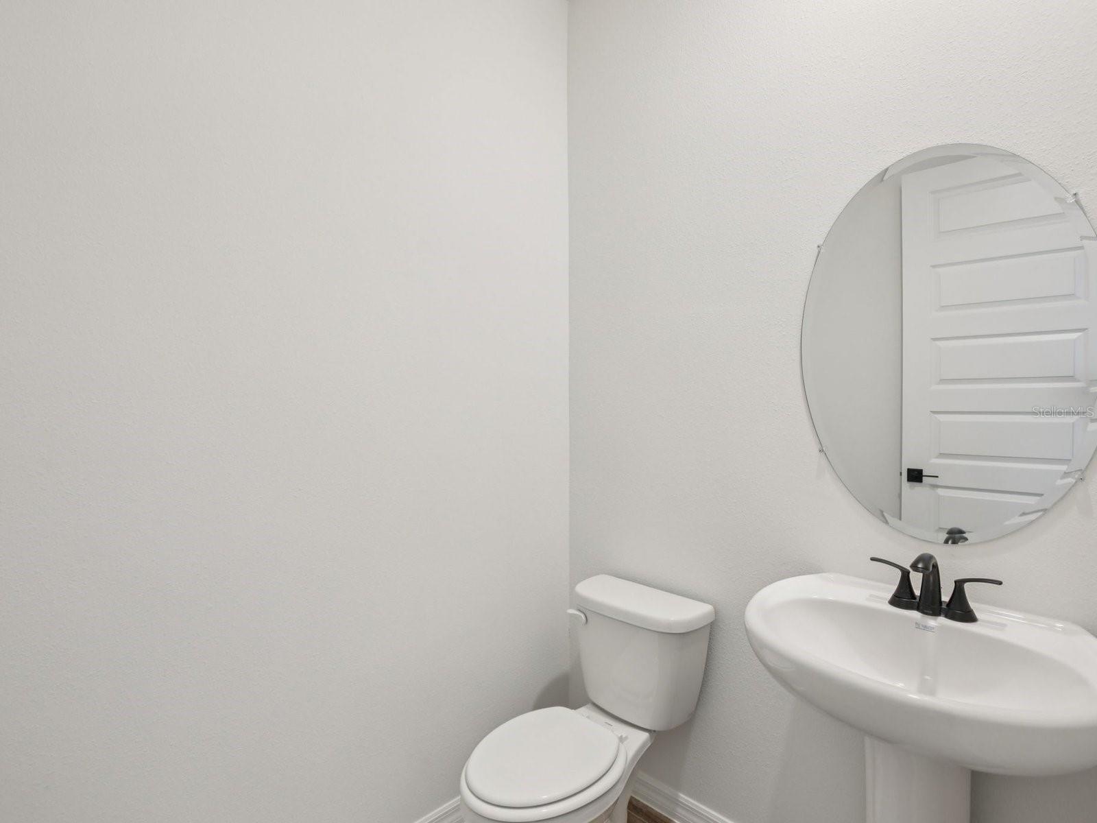 Photo is not of the actual home, but is an inspirational photo of builder’s model home and may depict options, furnishings, and/or decorator features 
