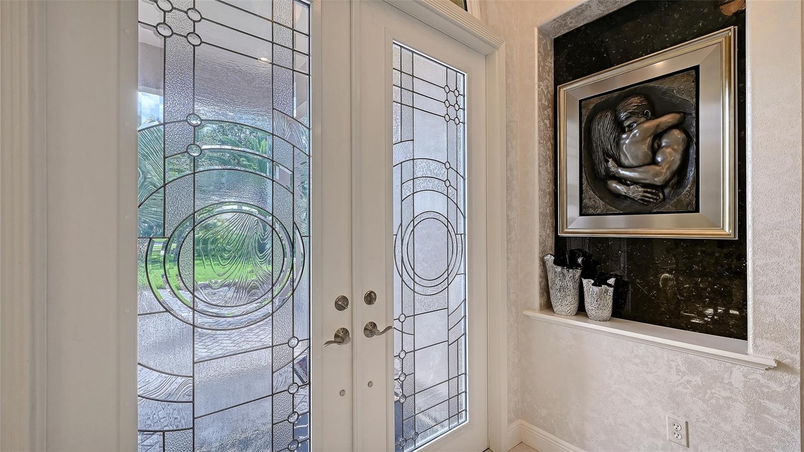 Double paned glass entry door.