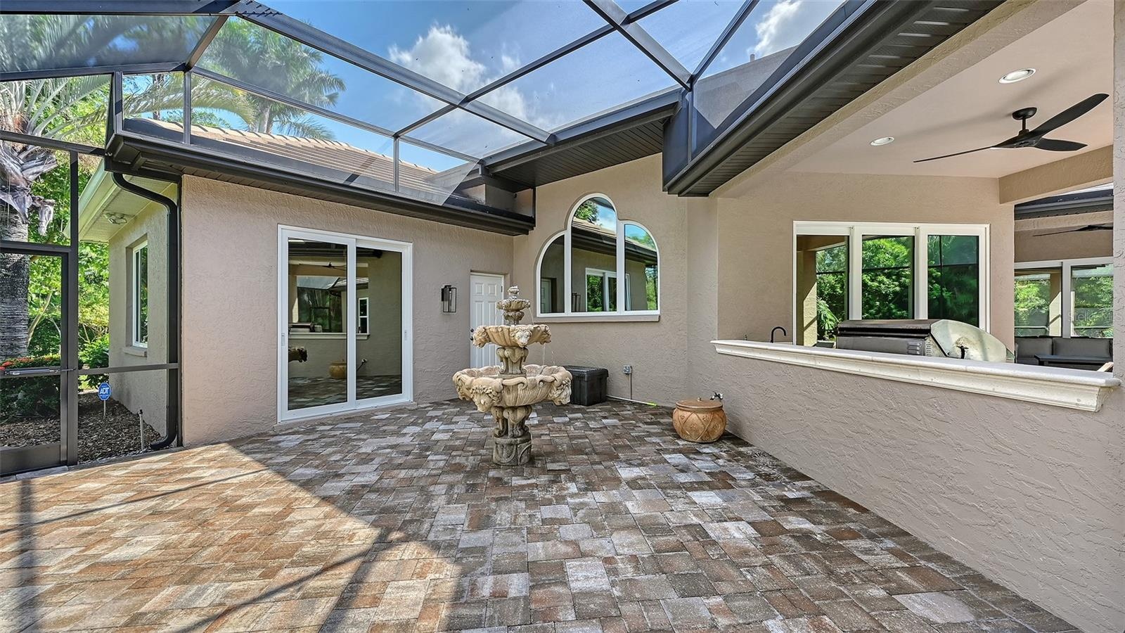 Side screen pool area with fountain.