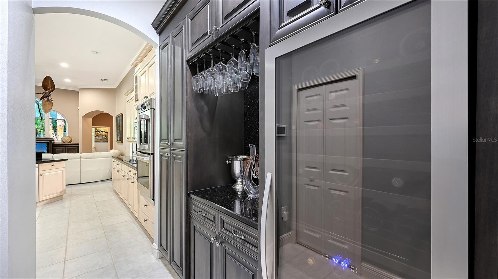 Butler Pantry and Wine Cooler in Kitchen Hallway.