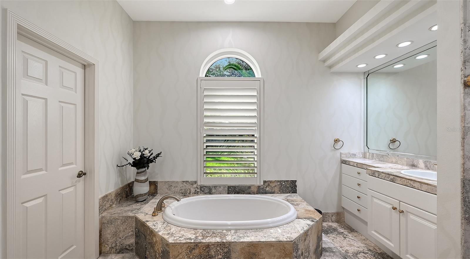 Primary Bathroom separate Tub.