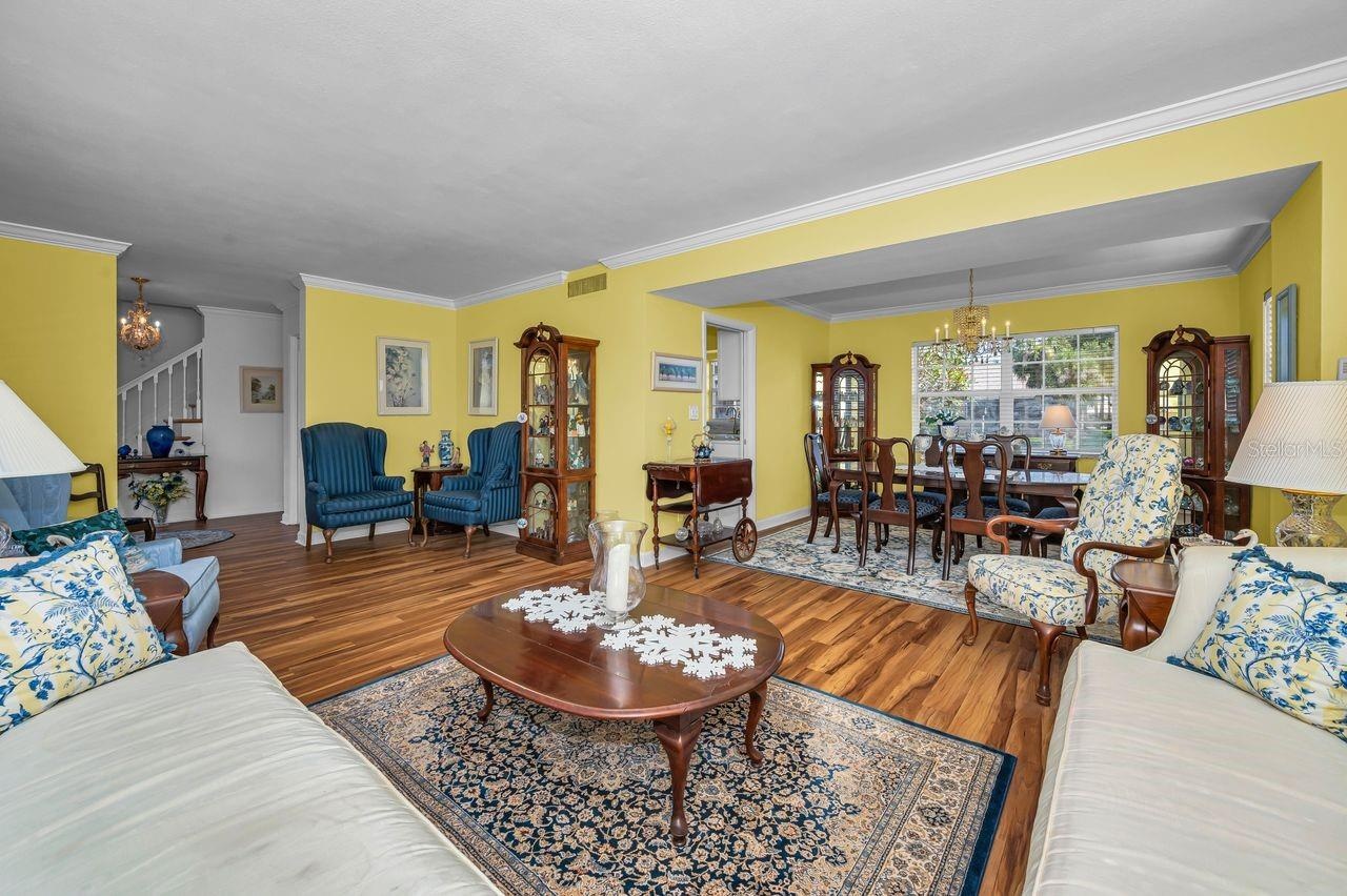 Foyer on left to open concept living and dining rooms