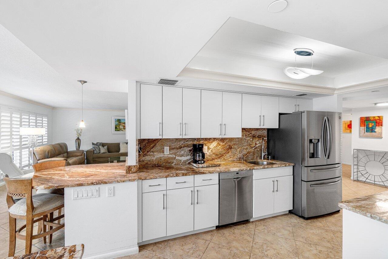 WHITE CABINETS WITH GRANITE COUNTERS