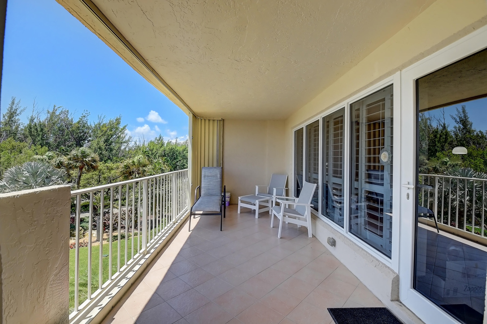 NEW EAST BALCONY WILL NO LONGER HAVE A CEMENT WALL (JUST NEW WHITE RAILINGS) NO SHUTTERS & BE PAINTED WHITE (BUILDING EXTERIOR ESTIMATED COMPLETION LA