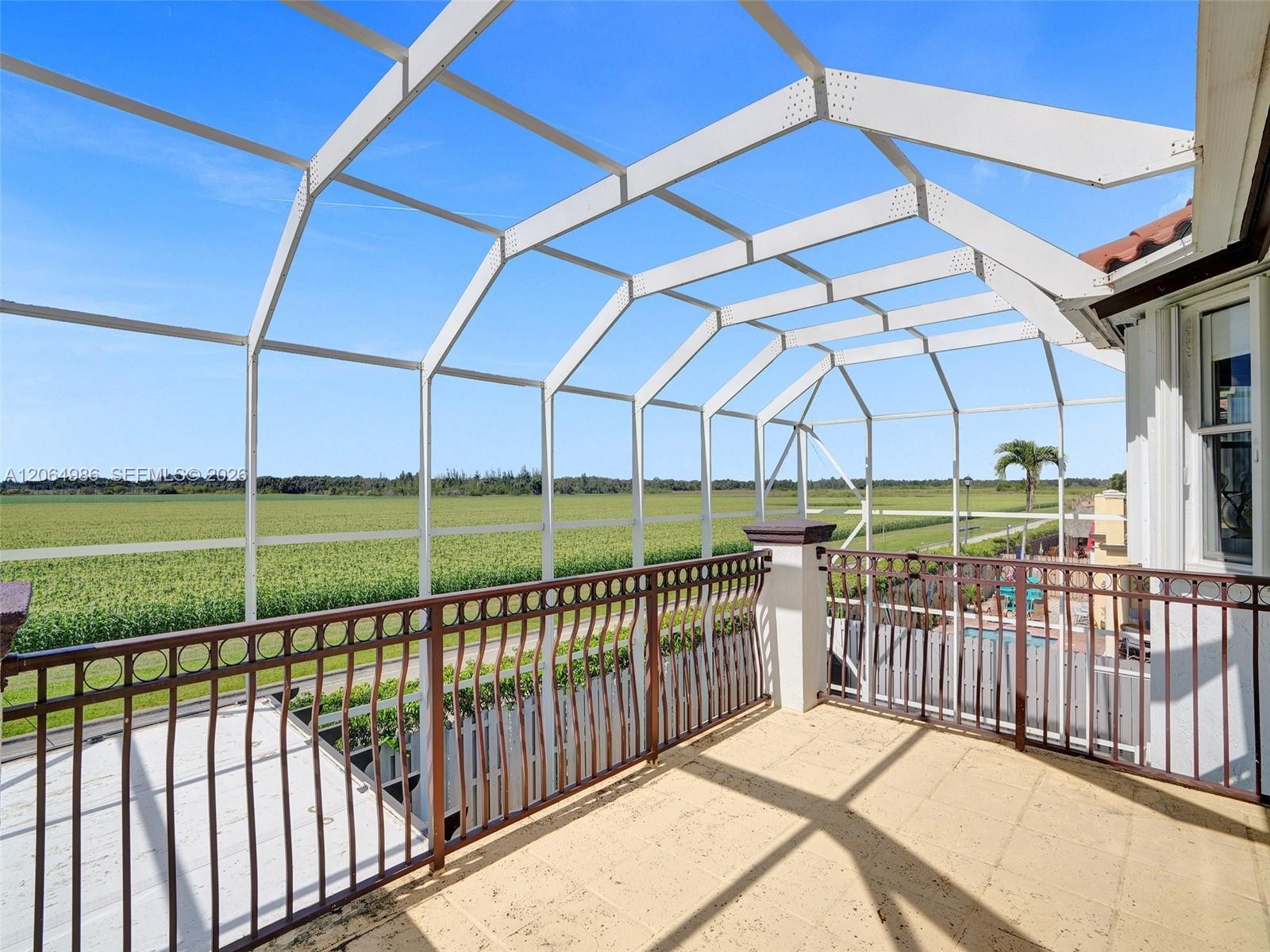 SECOND FLOOR BALCONY VIEWING NORTH OF THE PROPERTY.