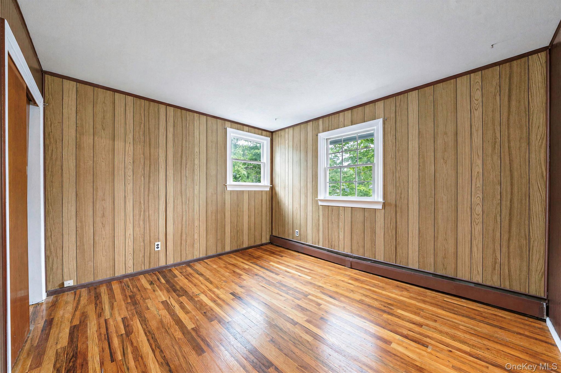 bedroom with hard wood floors