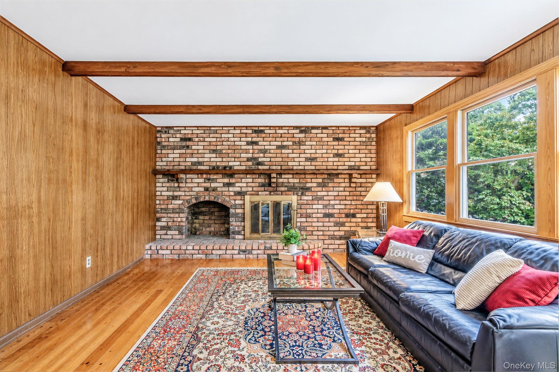 wood burning fireplace and hardwood floors
