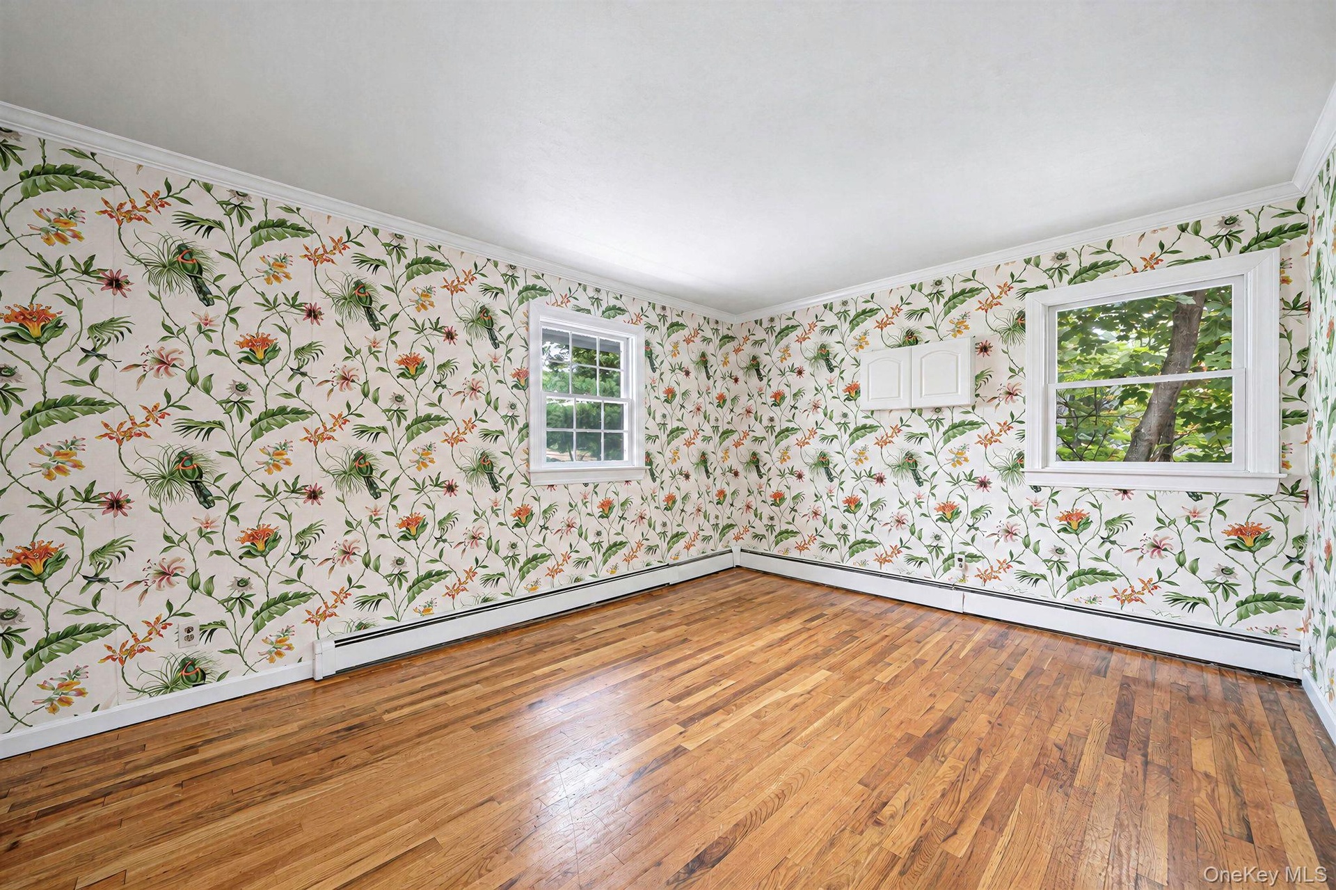 Bedroom with hard wood floors