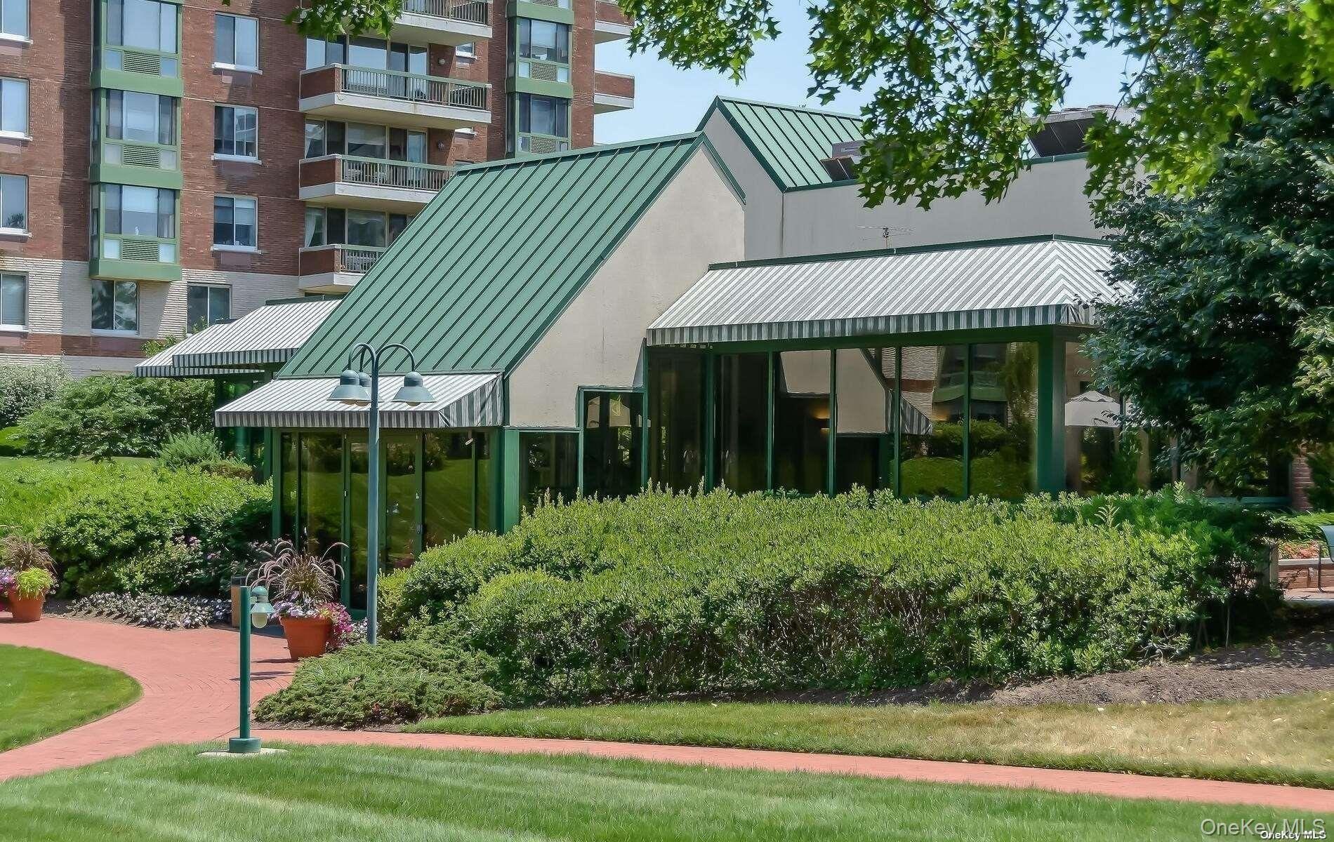 Community building which houses pool/spa/gym/sauna/locker rooms and party room