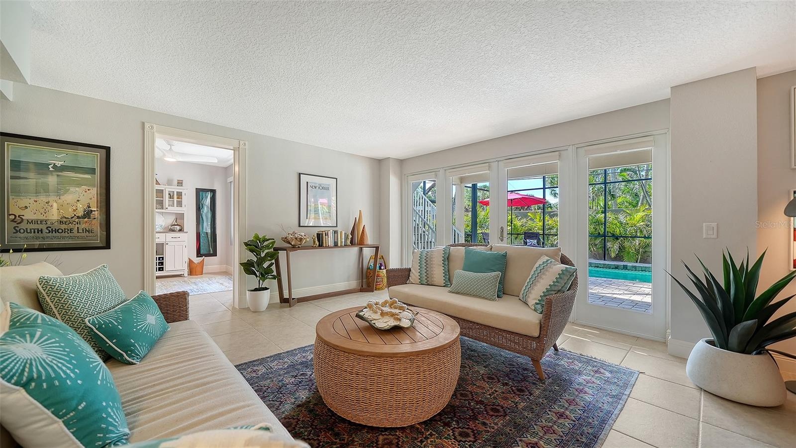 Spacious family room with French doors leading directly outside.