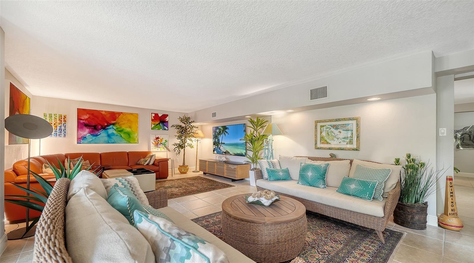 Expansive living space with easy access to the outdoor areas.