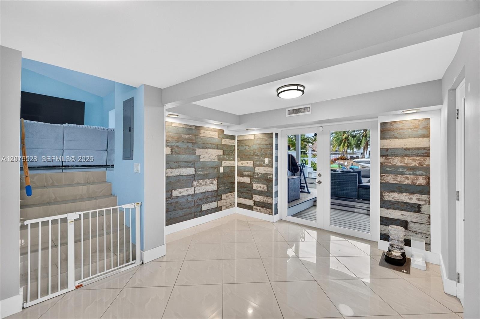Open kitchen, beyond this space are french doors to pool deck