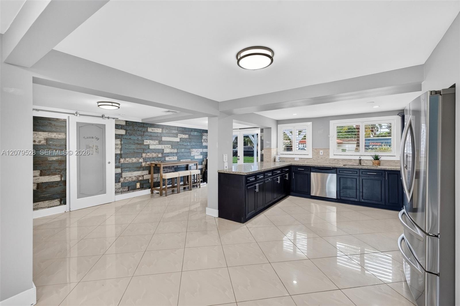 Walk in pantry w/ tankless water heater. Virtually Staged.
