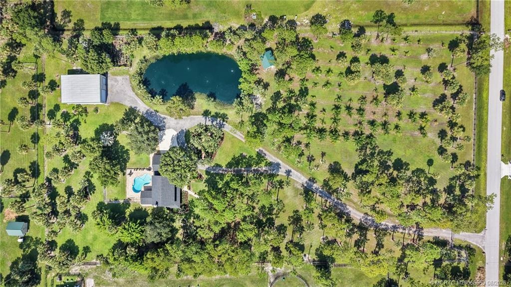 5 fenced and gated acres with home, 40x40 metal building with full bath.