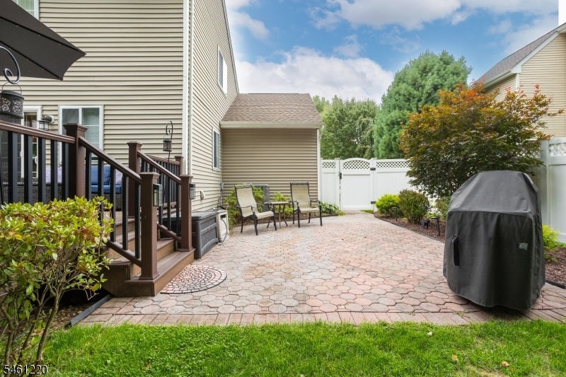 PAVER PATIO OFF TREX DECK