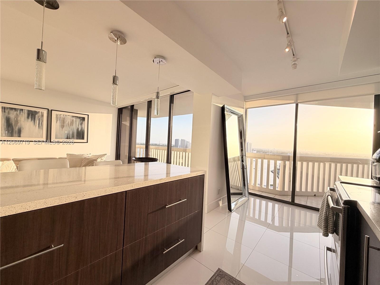 kitchen with view to living room and open countertop