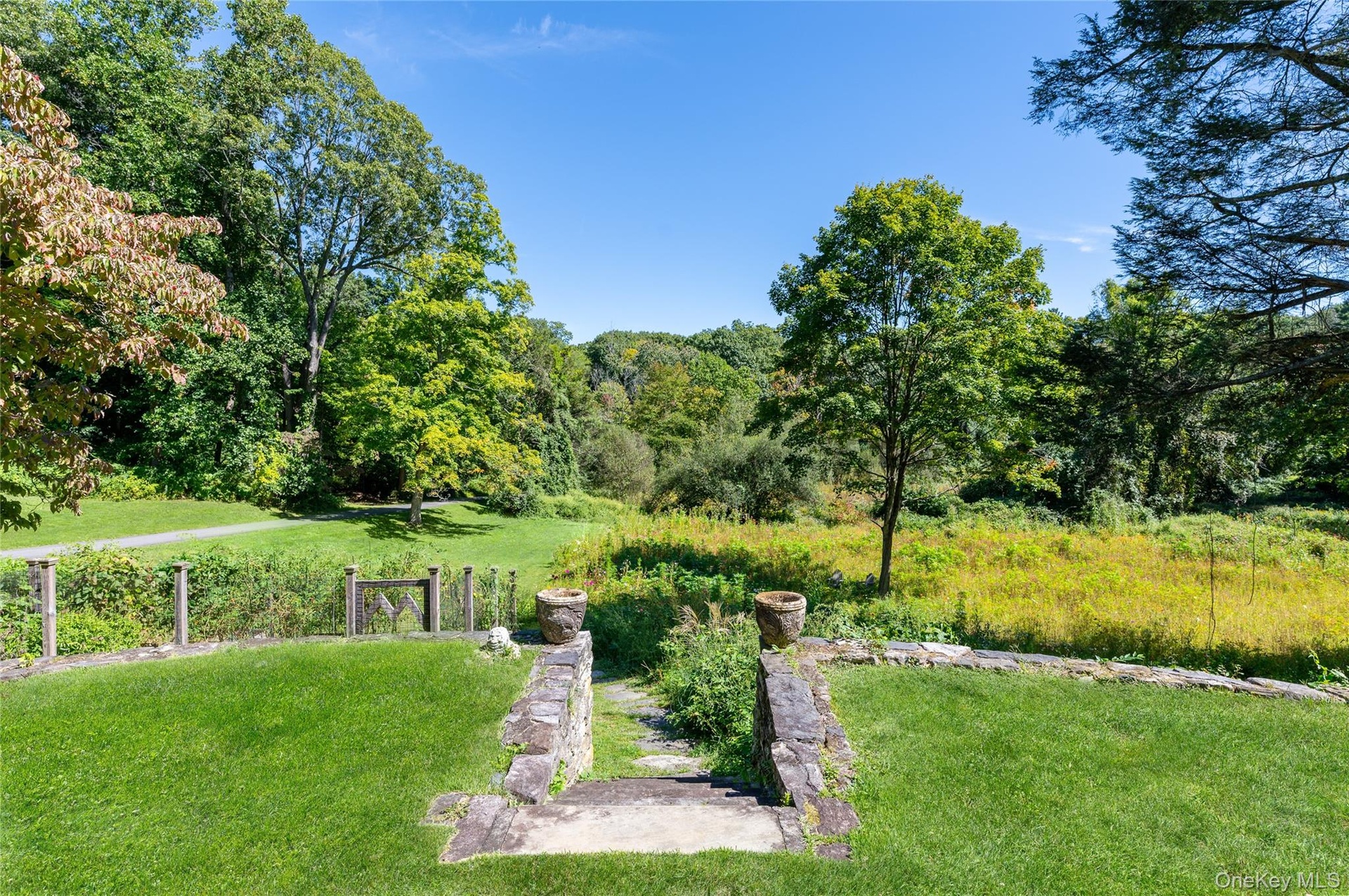 Stone steps to garden and meadows.
