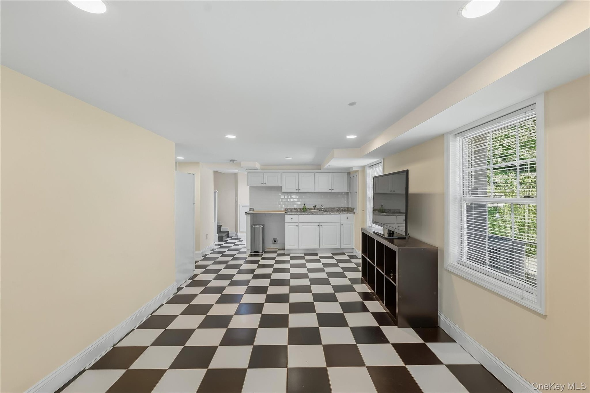Downstairs, a whole new dimension of living space awaits.