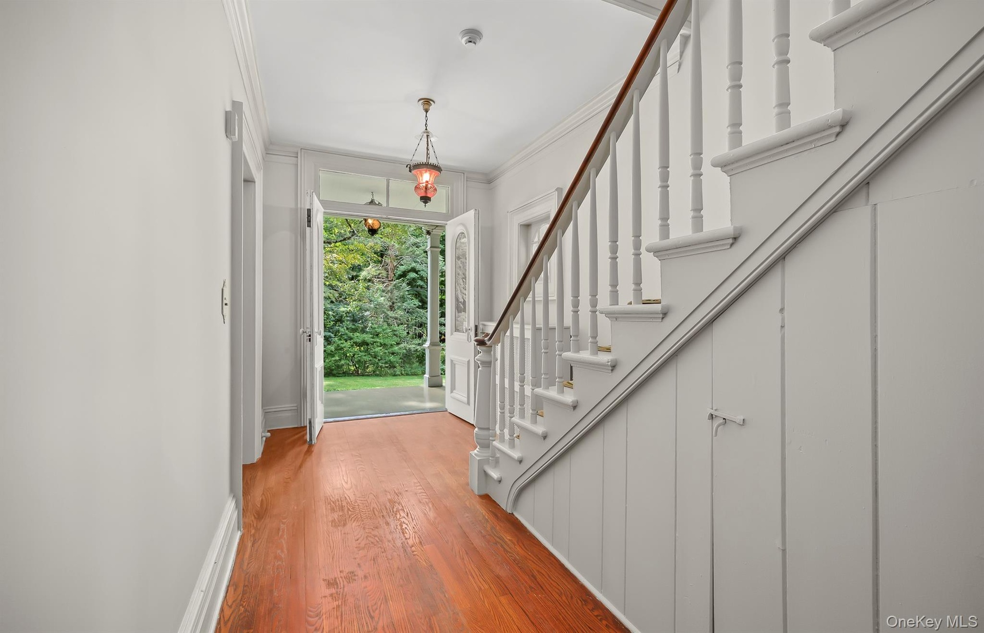 Front Entryway with Front Staircase from Porch