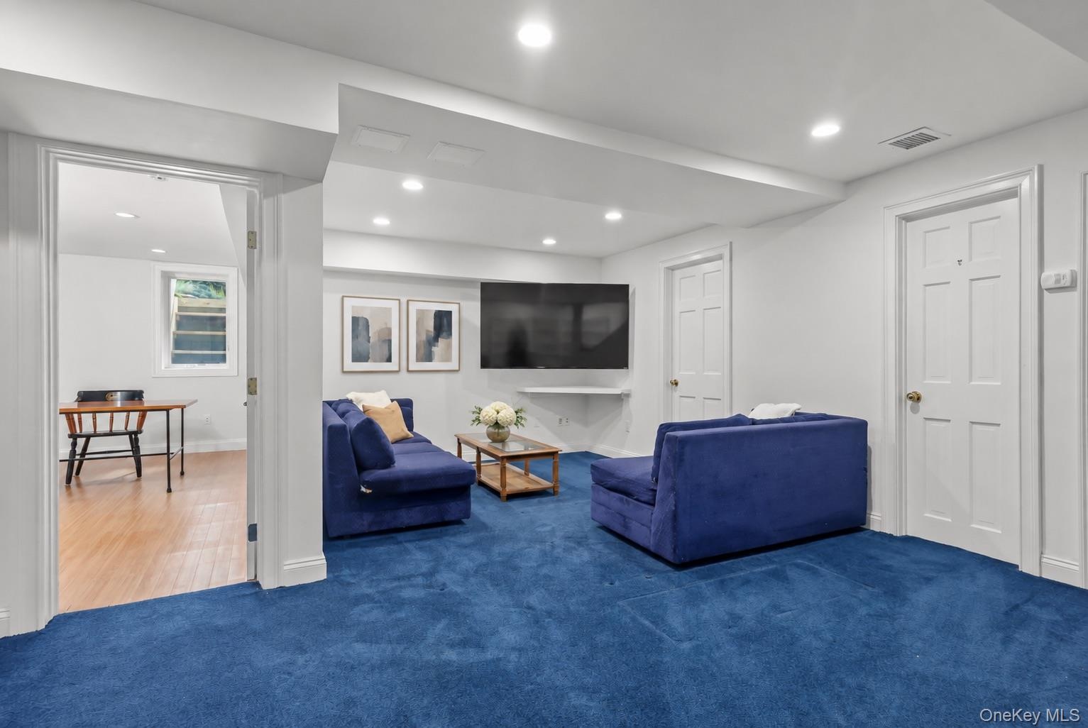 Finish Lower Level with Media Room, Powder Room, Storage Closets and Access to Garage