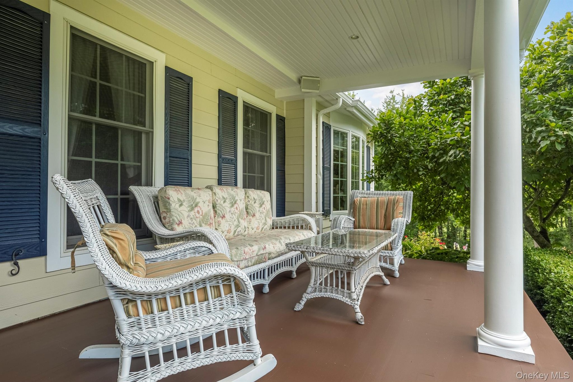 Front Porch with multiple Seating Areas