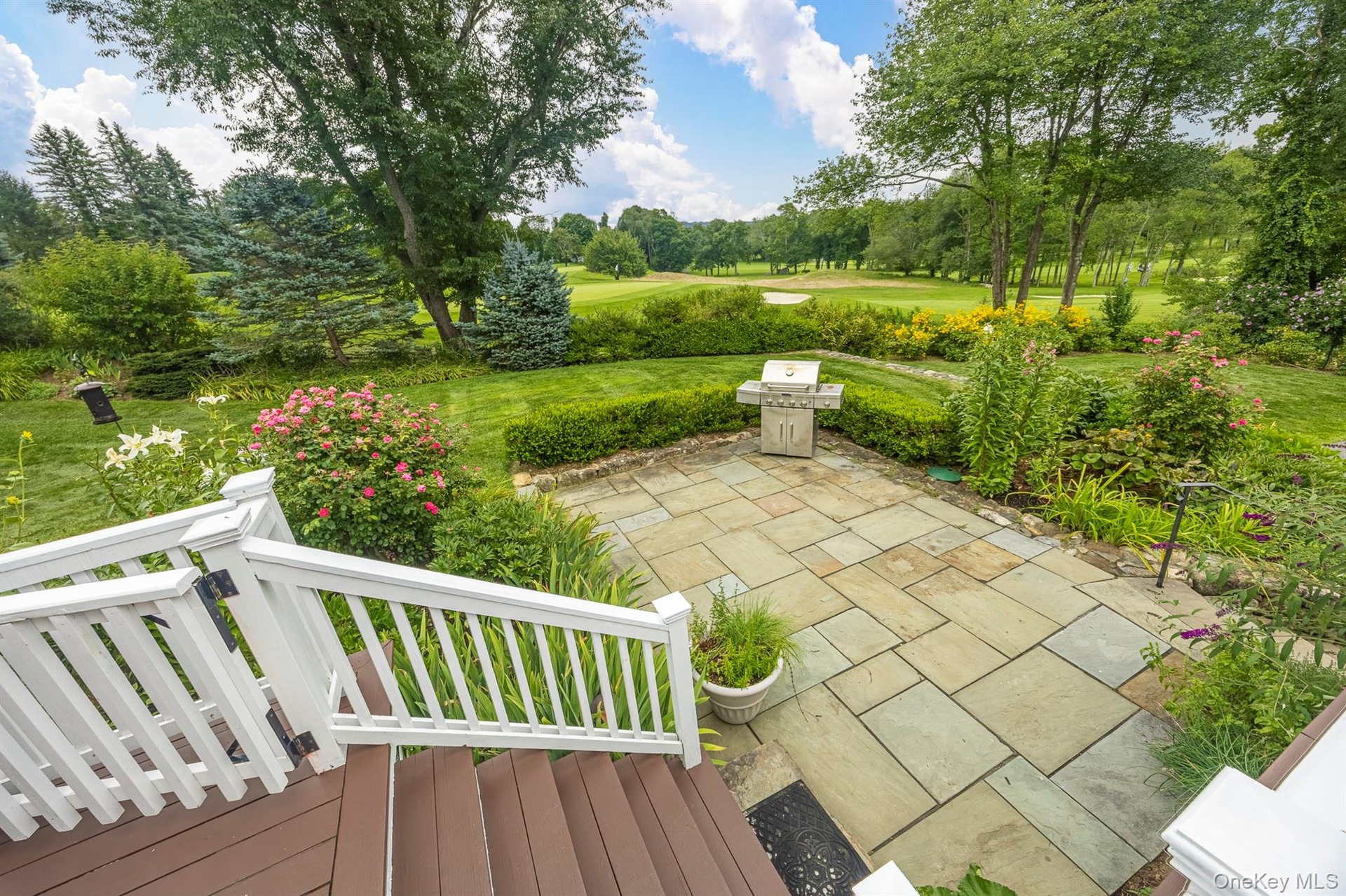 Deck Steps down to Blue Stone Patio