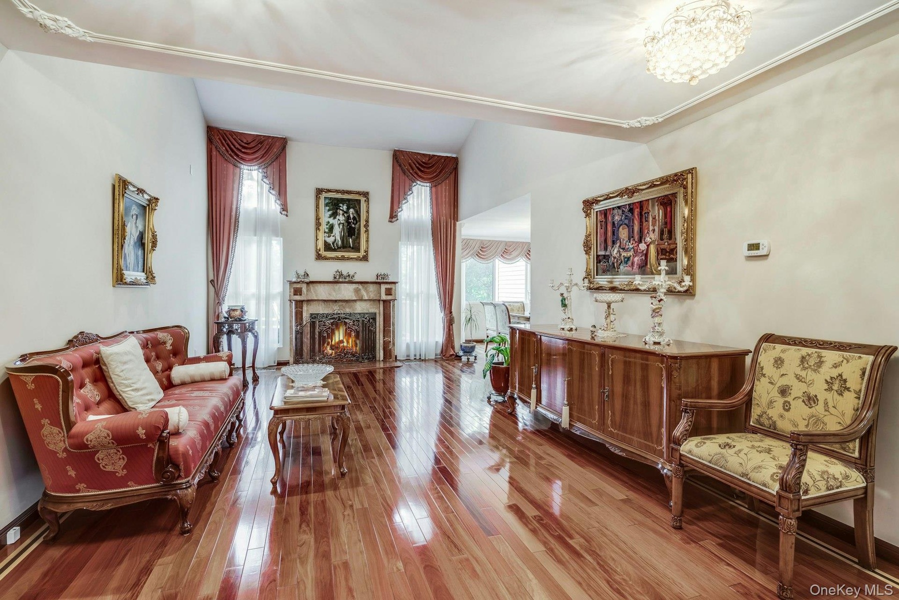 Living room with wood burning fireplace