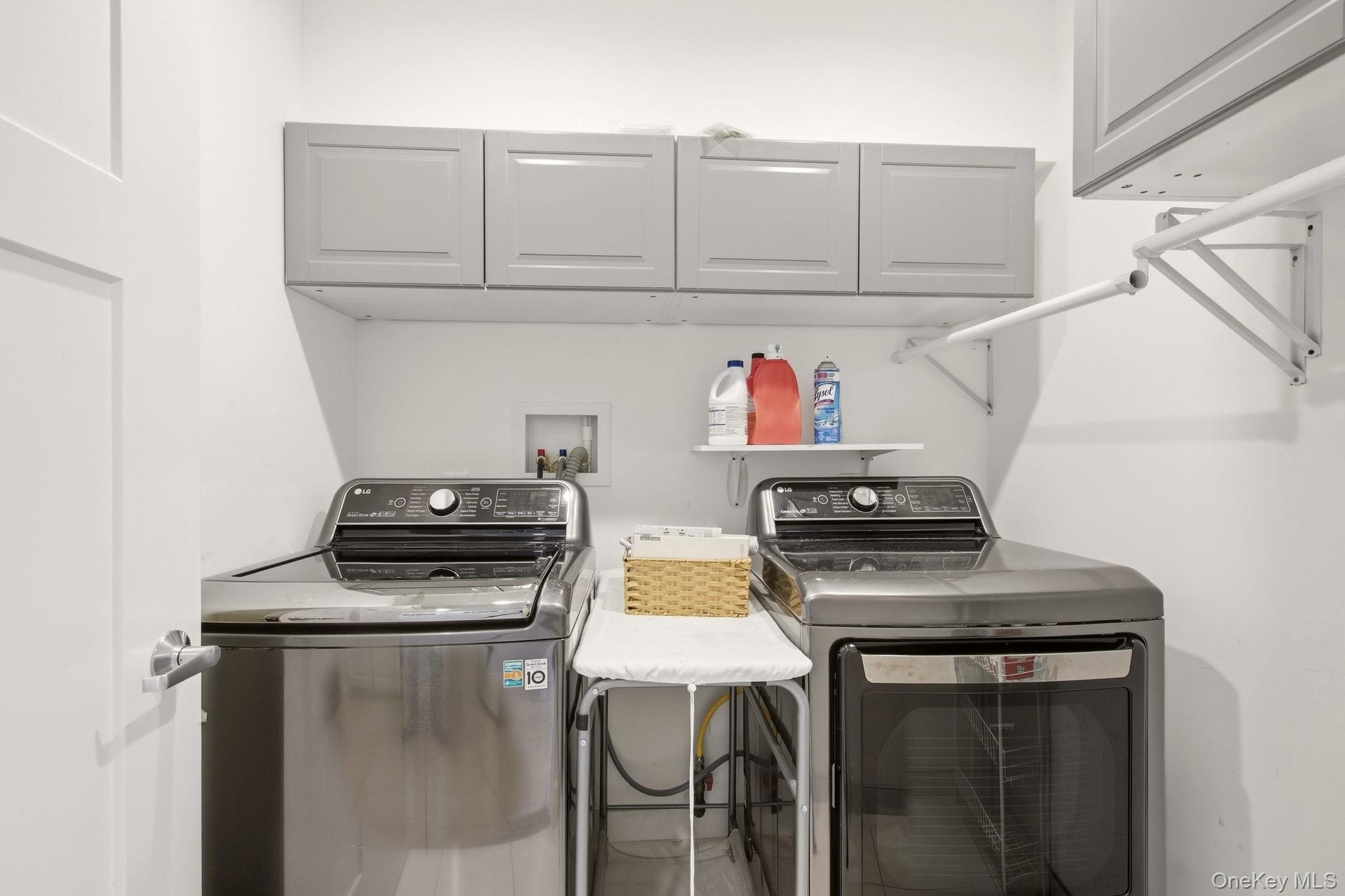 Laundry room on floor with bedrooms