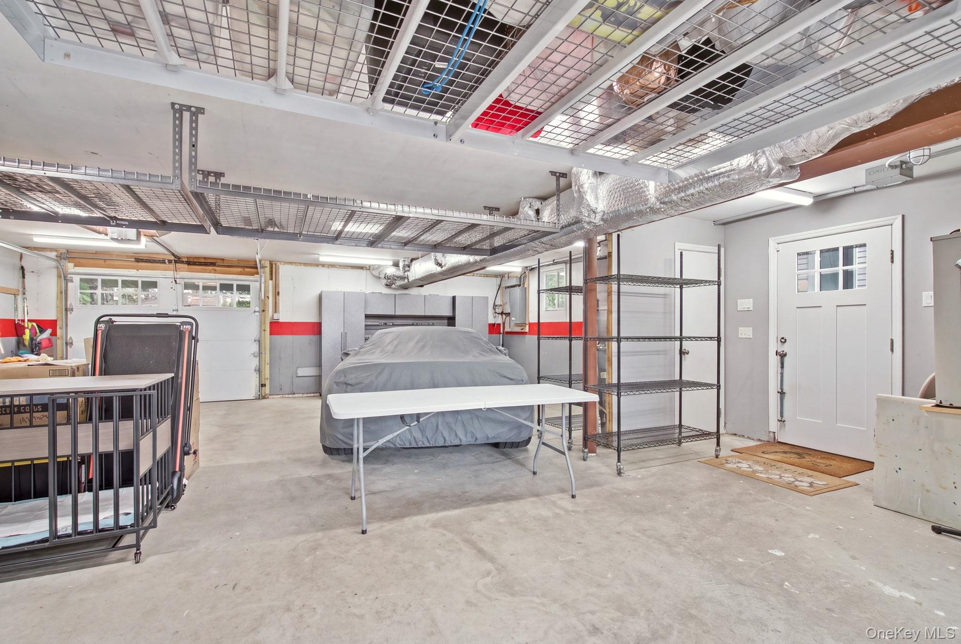 Overhead storage racks and wall mounted storage cabinets