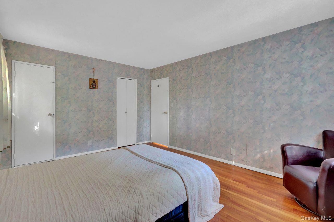 Large Primary Bedroom with walk in closet and bathroom access.