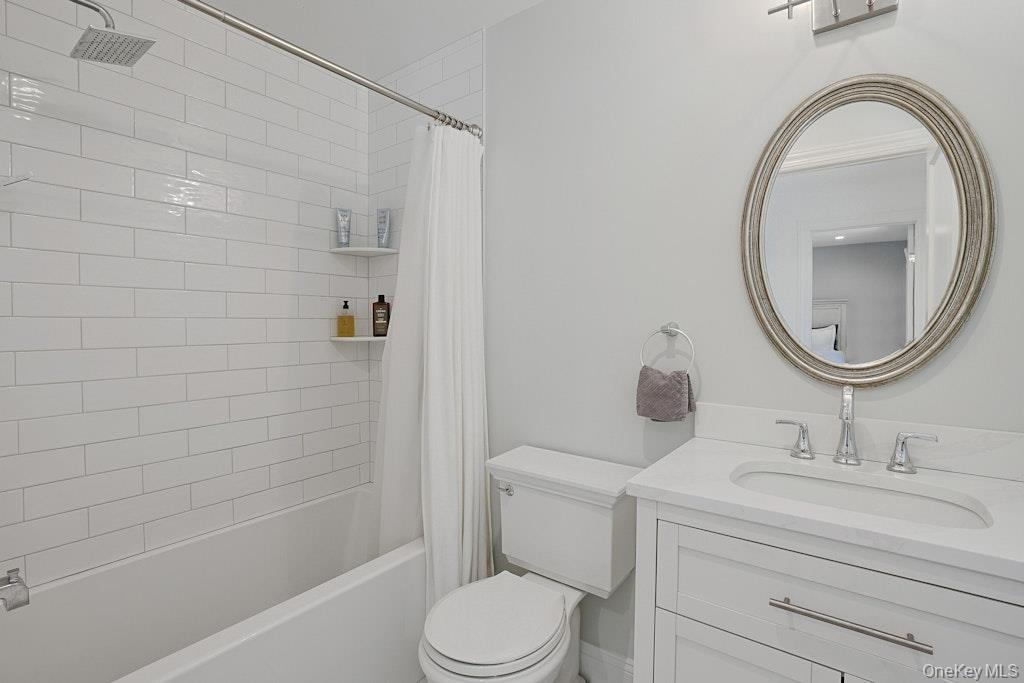 Well appointed full bathroom featuring a relaxing tub/shower