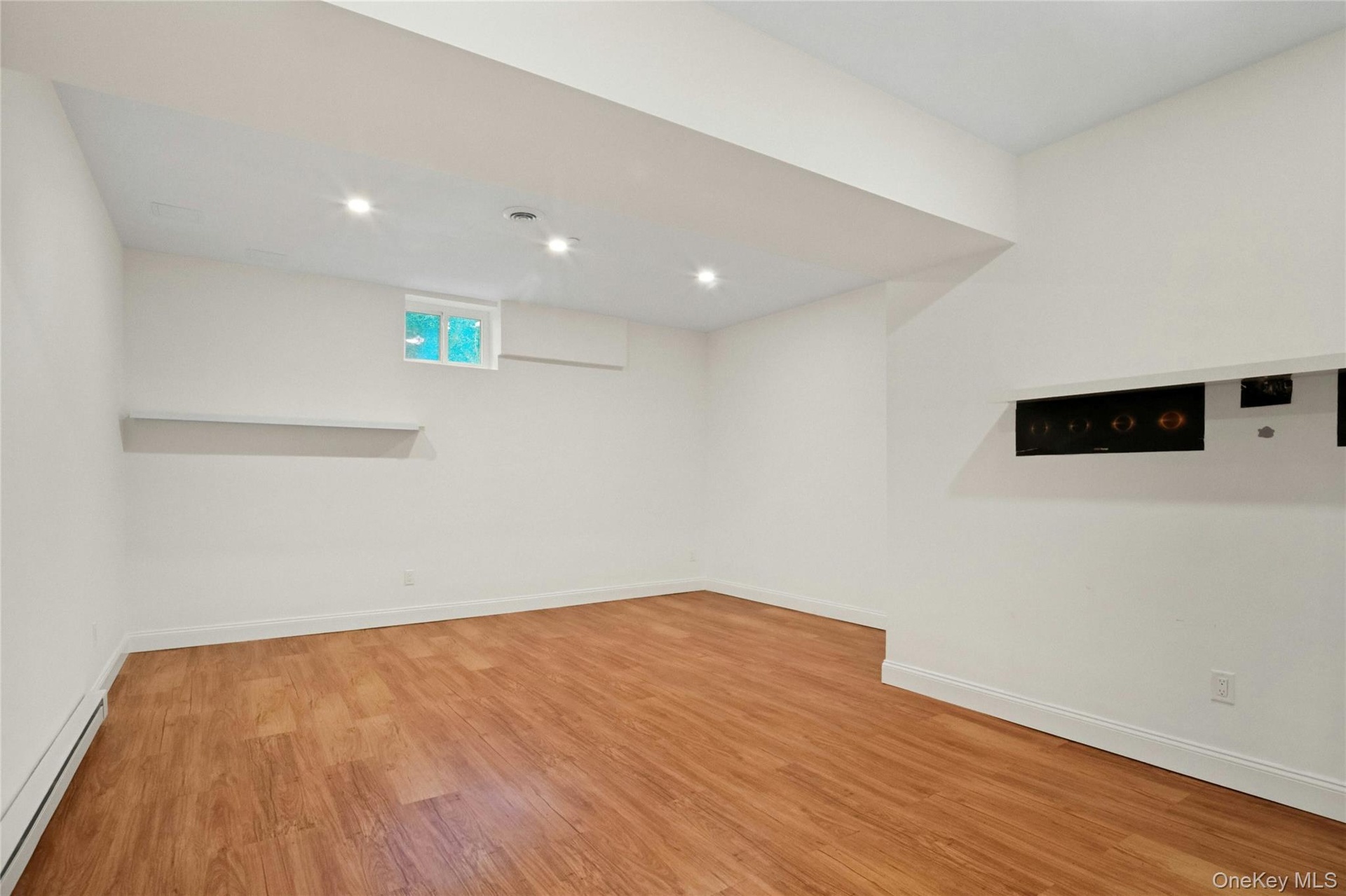 High ceiling, Rec Room and a bonus room with door to the side yard.