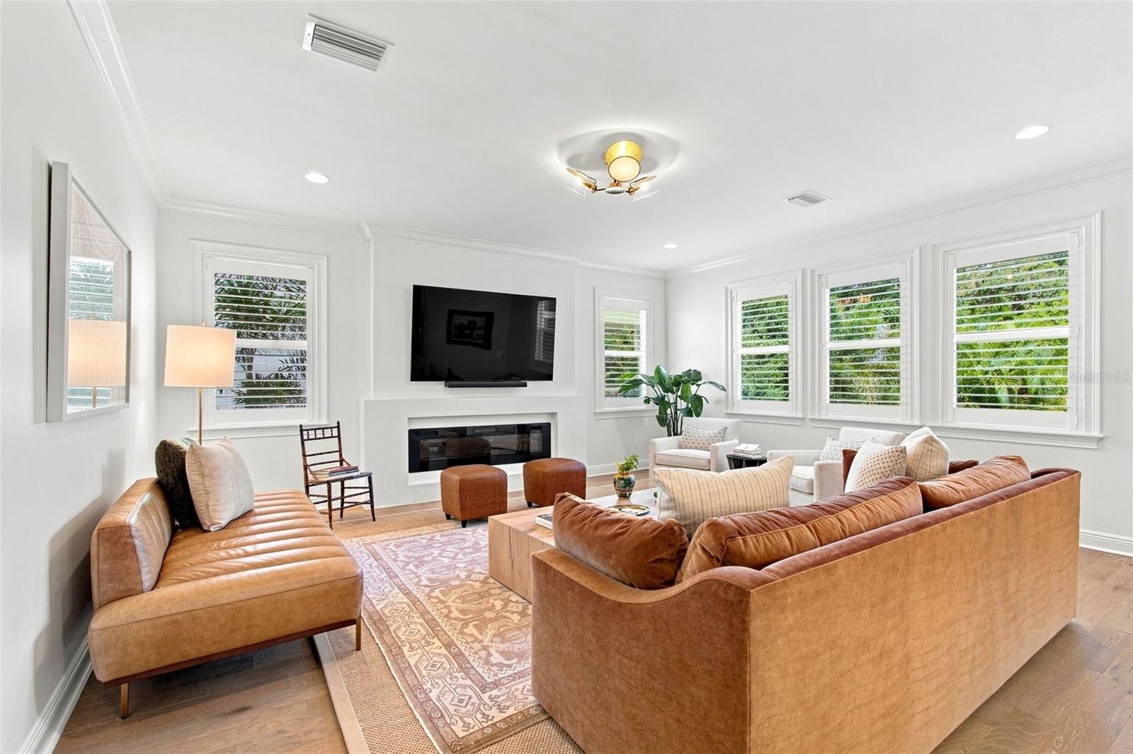 A fireplace offers a focal point in the family room.
