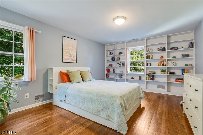 Bedroom with hardwood floors