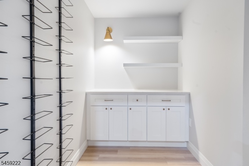 Lower level hidden wine room