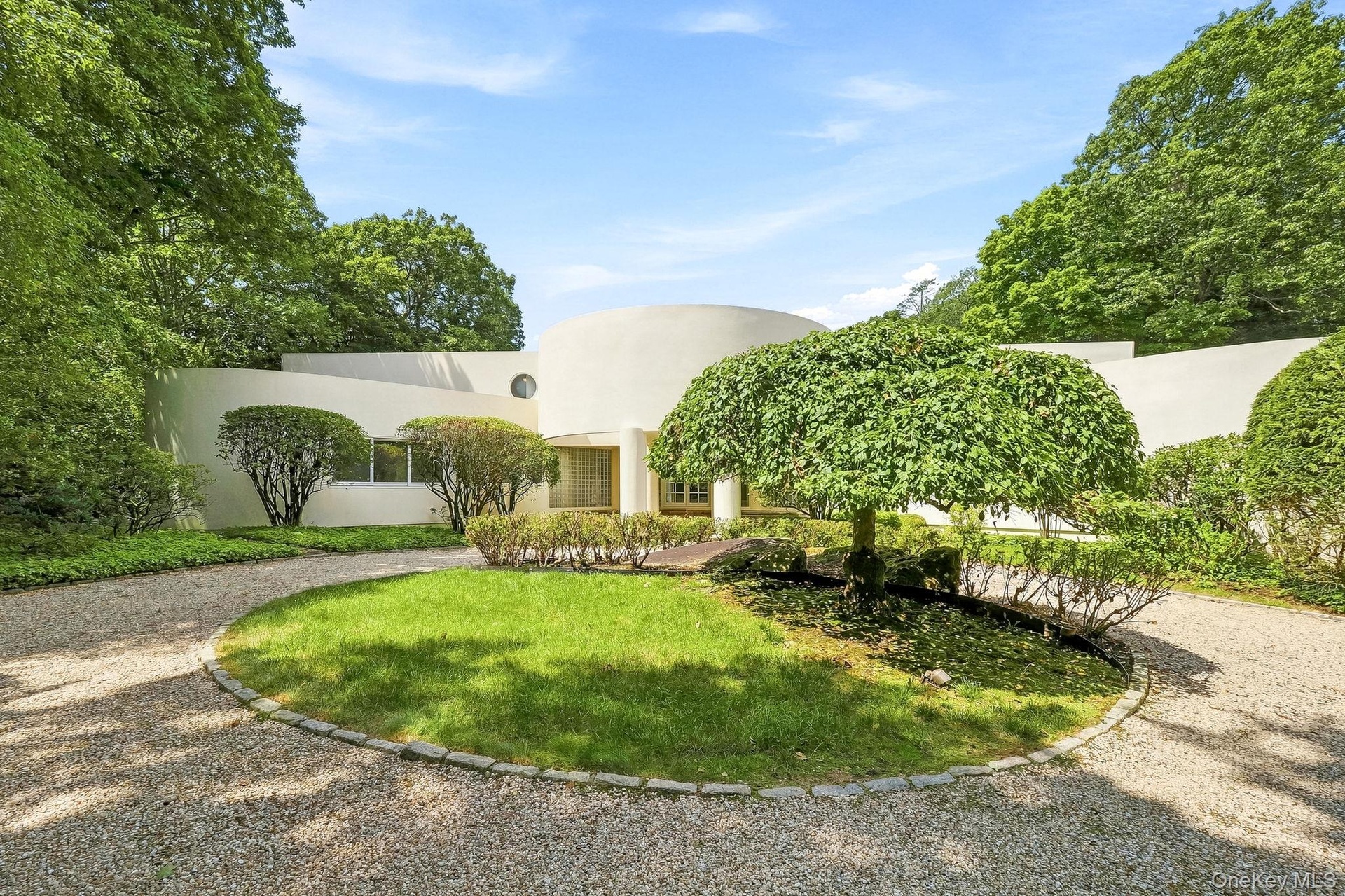 Sophisticated architectural design with distinctive curved elements.