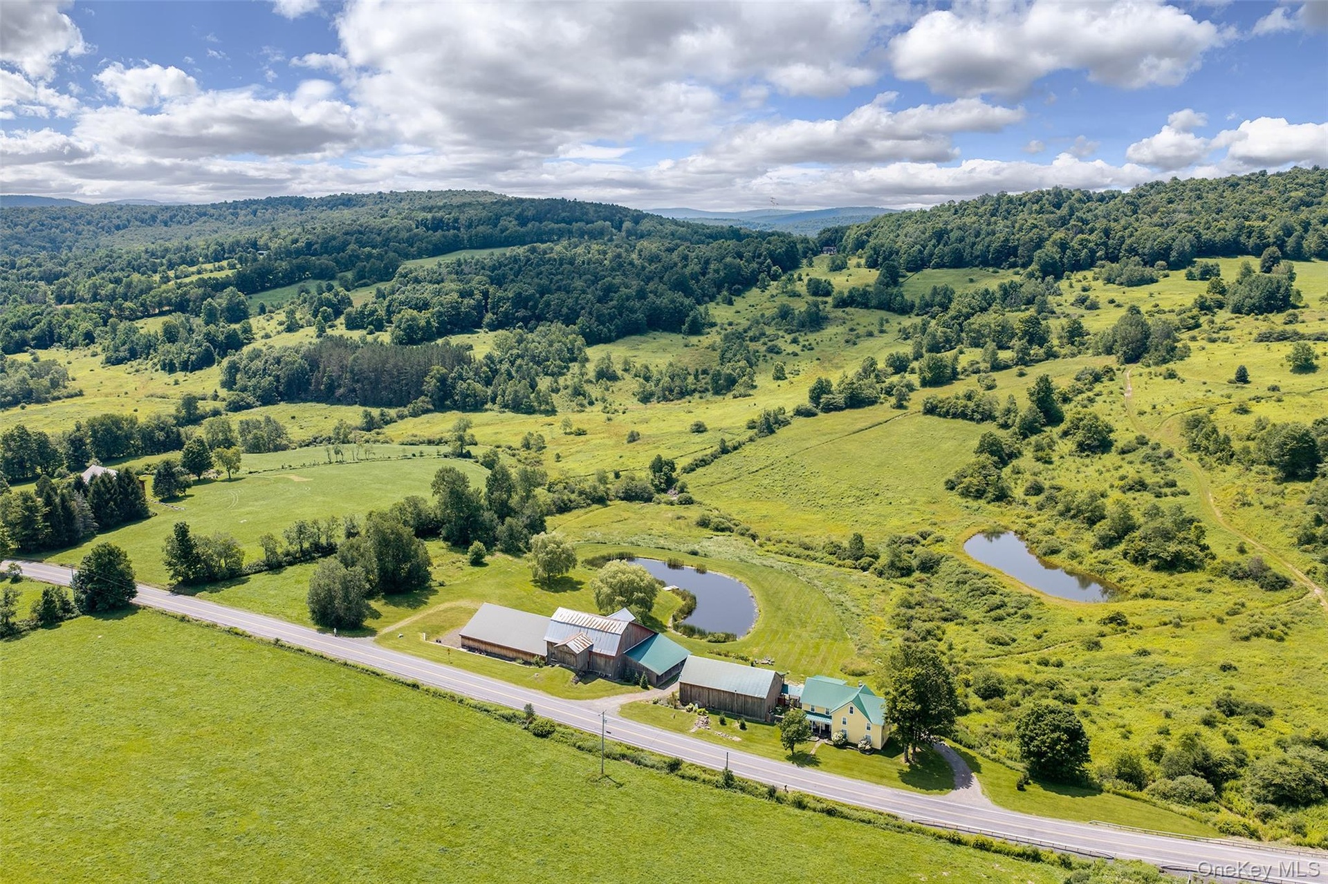 16 acres, 2 ponds, 3 buildings