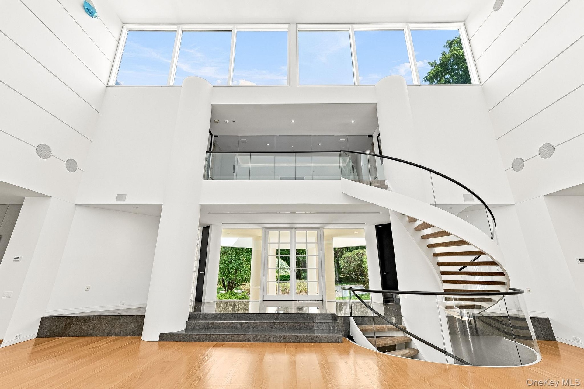 Living room with stairway to the second floor