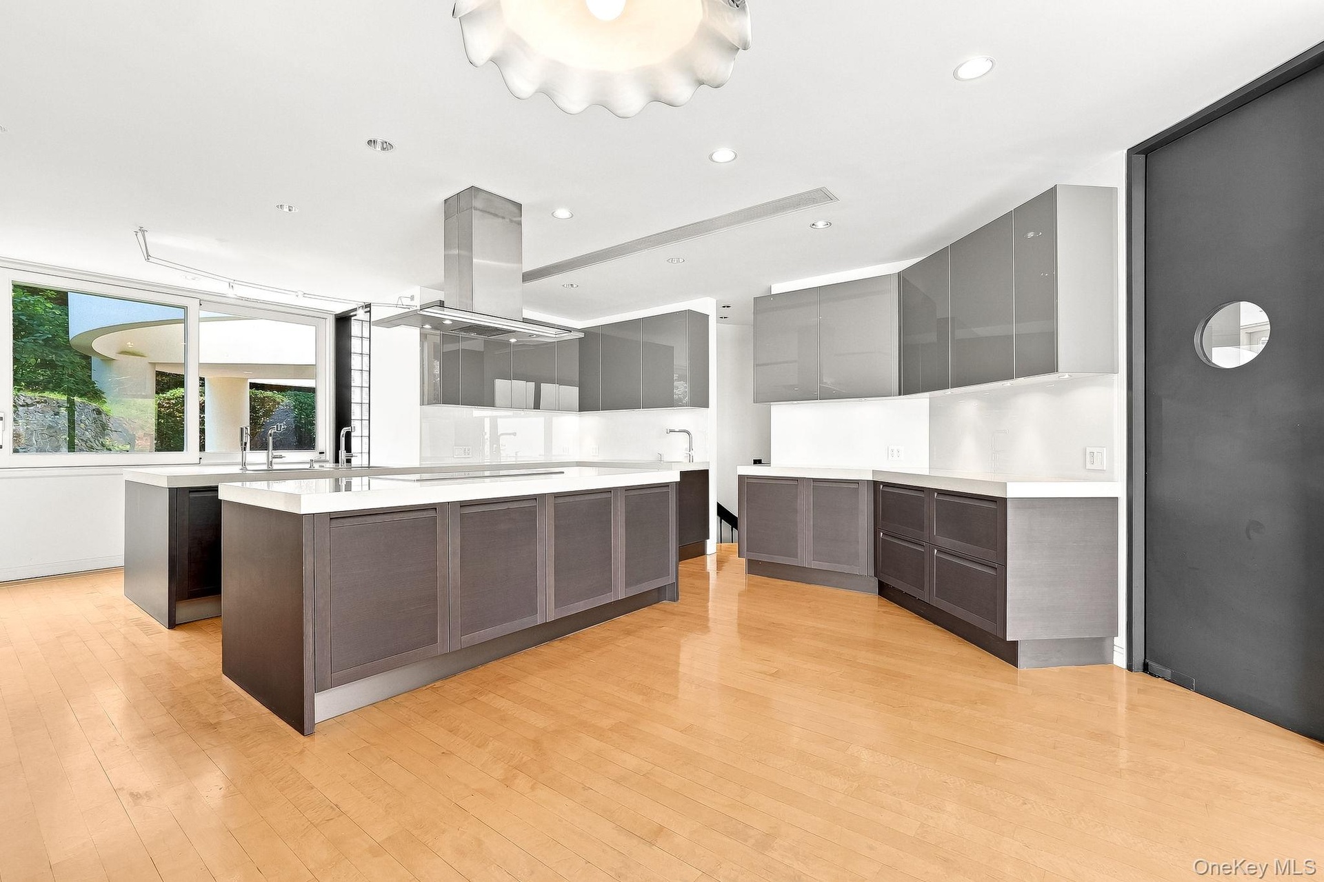 Kitchen with built-in freezers and refrigerator.