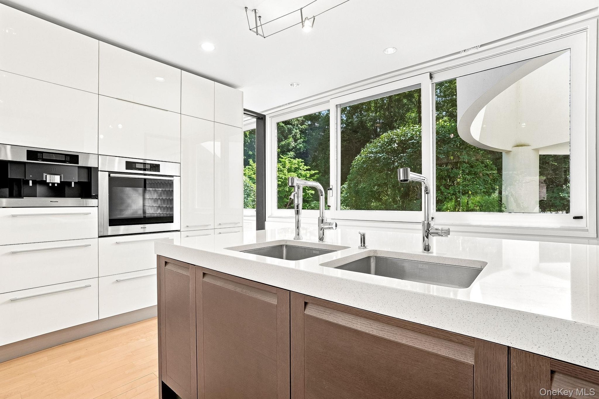 Double sink and views into front yard.