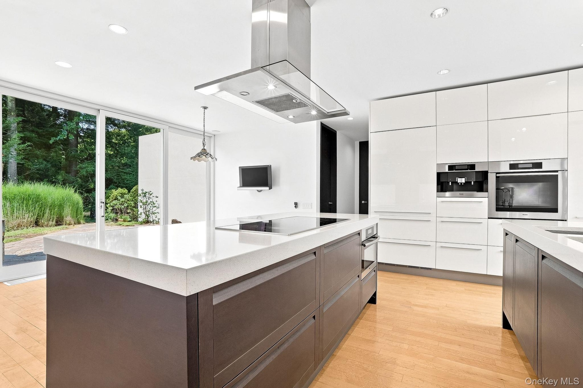 Built-in coffee machine and TV.