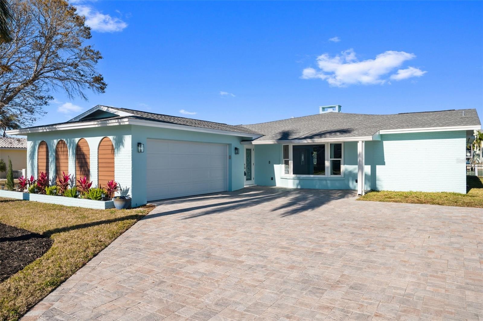 Front of the home with a 2-car garage.