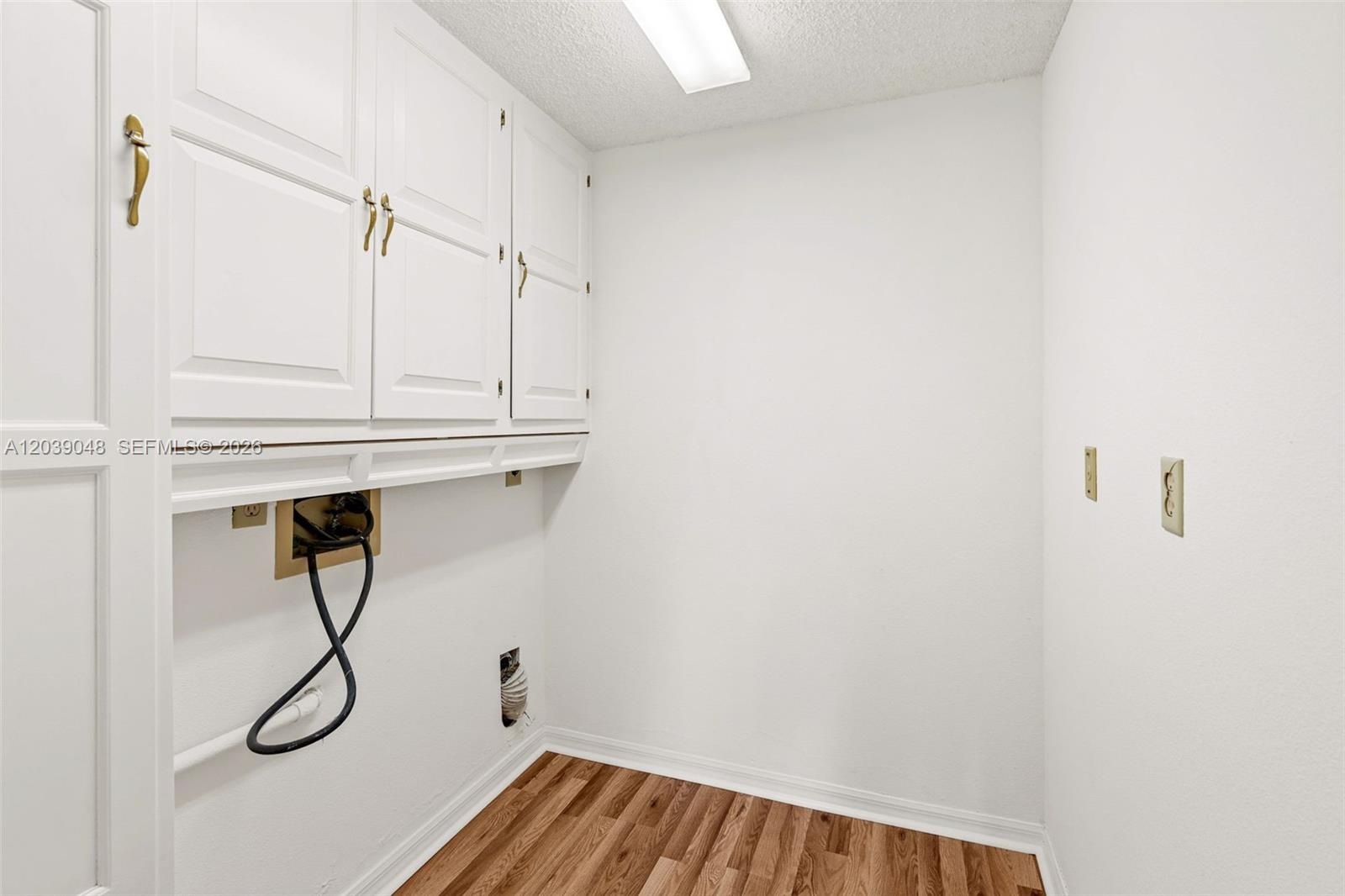 Well-placed utility room offering ease of access and a functional setup for daily living needs.