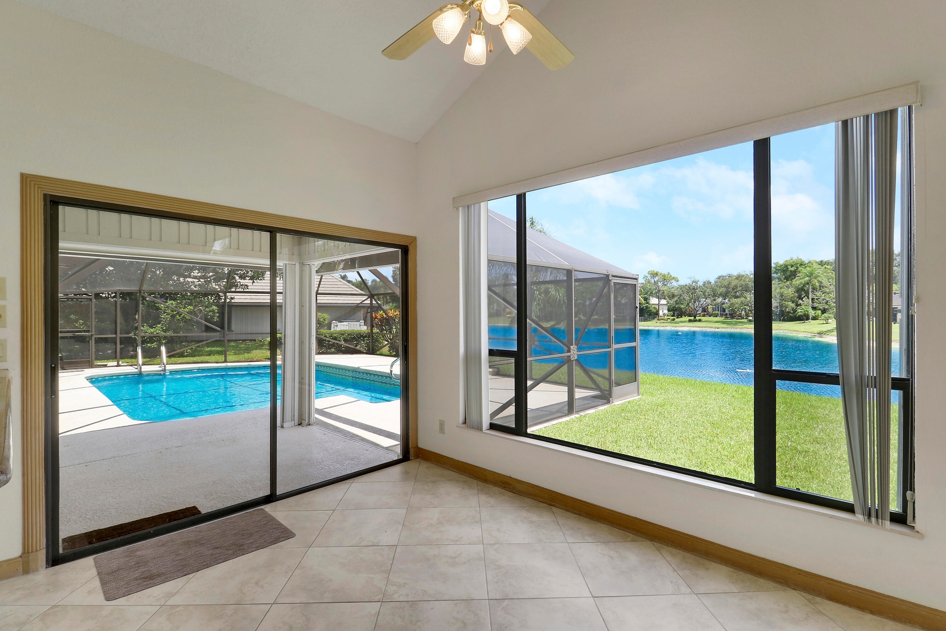 Pool and lake views from family room.
